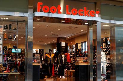 Foot Locker lowers full-year outlook again, pauses dividend as 2Q sales  fall on cautious consumers