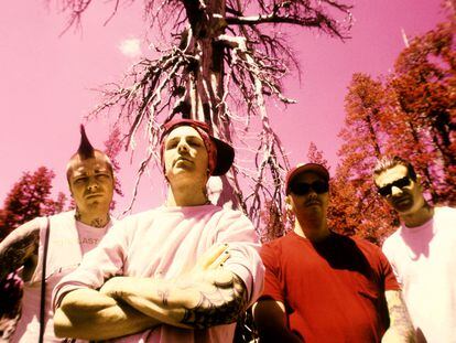 Lars Frederiksen, Tim Armstrong, Brett Reed and Matt Freeman of the punk band Rancid pose at Lake Tahoe, California, in the summer of 1998.