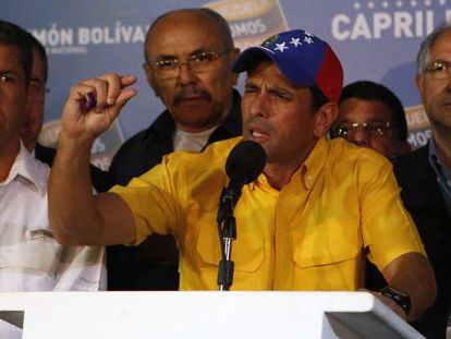 Venezuela&#039;s opposition leader Henrique Capriles gestures during a news conference in Caracas on Monday. 