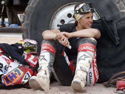 Spanish motorbike rider Laia Sanz rests after a stage of this year&#039;s Dakar Rally.