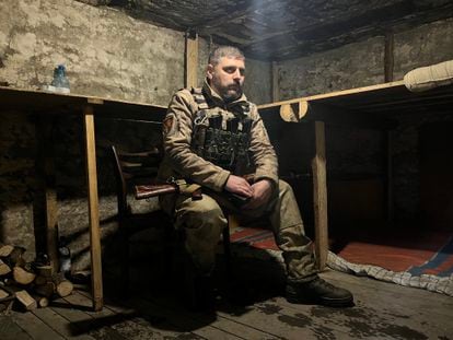 A soldier, in the shelter believed an outpost on the Kremina front.