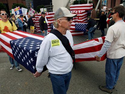 Protesters carry flag-draped mock coffins as they prepare to take part in an anti-Iraq War march in Los Angeles in January 2007.