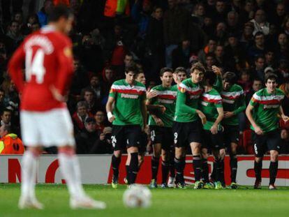 Athletic players celebrate a Fernando Llorente goal at Old Trafford. 