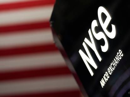 An NYSE sign is seen on the floor at the New York Stock Exchange in New York, Wednesday, February 22, 2023.