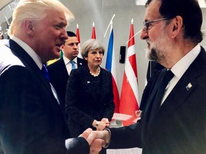 Spanish PM Mariano Rajoy greets Donald Trump at the NATO Summit in Brussels, in May.