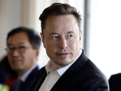 Elon Musk looks on as he attends a roundtable during the 6th edition of the "Choose France" Summit at the Château de Versailles, outside Paris, France, on May 15, 2023.