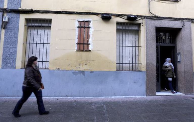 A ground-floor flat in Madrid's Arganzuela district is boarded up to deter squatters.
