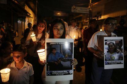 Protesters hold photos of loved ones who have been killed or imprisoned under the Daniel Ortega regime.