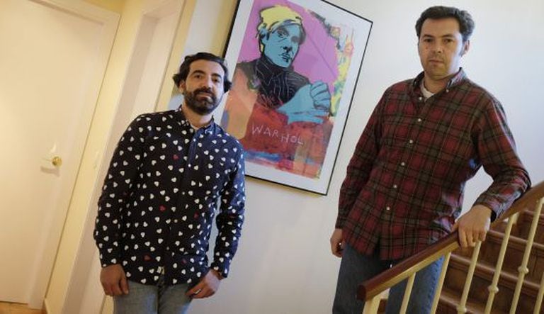 Ricardo Lucas and Iván Vallejo inside their home in Seville.