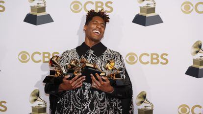 Jon Batiste in April 2022 in Las Vegas with his five Grammy Awards; he beat out Taylor Swift, Justin Bieber and Billie Eilish. 