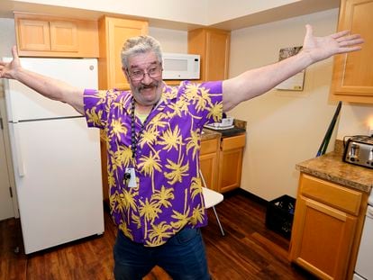 Thomas Marshall shows off the kitchen in his one bedroom apartment, which he got as part of the new housing program, in Sacramento, California, on February 24, 2023.