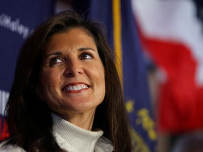 Republican presidential candidate Nikki Haley listens as she is introduced during a campaign stop in Hooksett, New Hampshire, U.S., November 20, 2023.
