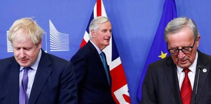 Britain's PM Boris Johnson, EC President Jean-Claude Juncker and the European Union's chief Brexit negotiator Michel Barnier at a press conference today after agreeing the latest Brexit deal.