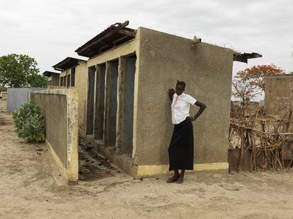 16-year-old Maria Nyasebit stands beside the Machakos Primary School bathroom in Bentiu. “The bathrooms at school don't have doors, so when you want to change your pad, people can see you. I wait until I get home to do it.”