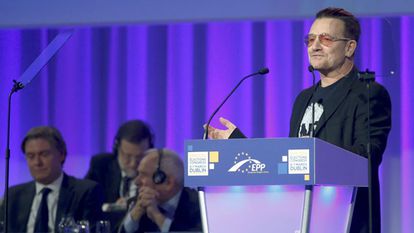 Bono during his speech, with Rajoy in the far background.
