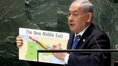 Israel's Prime Minister Benjamin Netanyahu uses a red marker on a map as he addresses the 78th session of the United Nations General Assembly, Friday, Sept. 22, 2023. (AP Photo/Richard Drew)