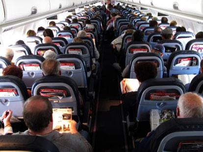 Passengers inside an Airbus plane.