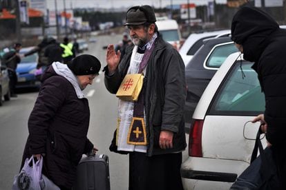 Father Tadeusz Wolos helped residents of Irpin get out of the city on March 5 of last year, by driving them to the edge of town and giving them his blessing.
