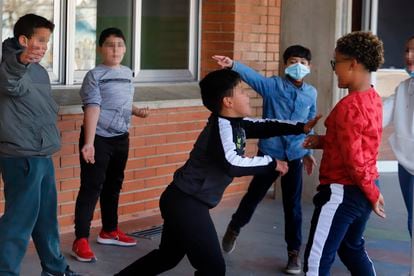 Children playing in the Spanish region of Catalonia after the requirement for mask use in schoolyards was lifted.