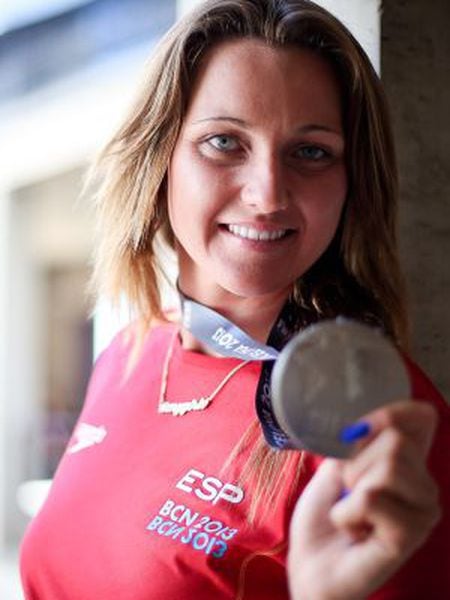 Melani Costa shows off her silver medal.