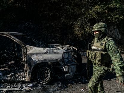 A torched car on the highway near the Culiacán municipality in the Mexican state of Sinaloa, where Ovidio Guzmán – El Chapo’s son – was captured on January 7, 2022.