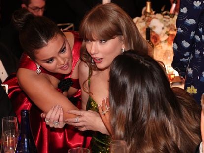 Selena Gomez and Taylor Swift with Keleigh Sperry (from behind) at the 81st edition of the Golden Globe Awards held at the Beverly Hilton hotel, on January 7, 2024, in Beverly Hills.