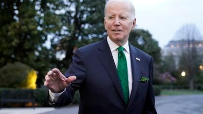 President Joe Biden waves as he walks to Marine One upon departure from the South Lawn of the White House, on March 17, 2023, in Washington.