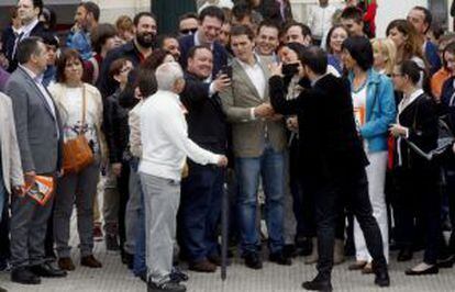 Ciudadanos leader Albert Rivera (in jeans) meets a crowd of supporters earlier this month.