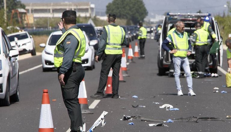 Civil Guard officers at a road accident.
