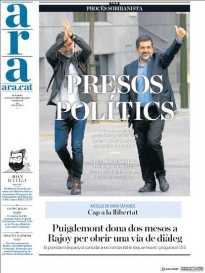 The front page of Catalan newspaper 'Ara' on Tuesday shows a picture of Jordi Sànchez and Jordi Cuixart with words "political prisoners."