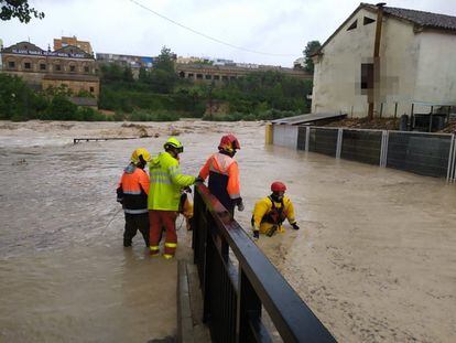 Rescue teams at work in Ontinyent (Valencia), one of the worst-affected areas after the River Clariano burst its banks.