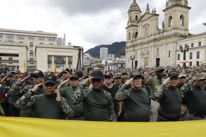 Retired military and police officers protest against the Colombian President's government, in Bogotá, on May 10, 2023.