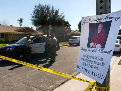 Los Angeles County Sheriff deputies guard the entrance to the street of Bishop David O'Connell's home in Hacienda Heights, Calif., Sunday, Feb. 19, 2023.