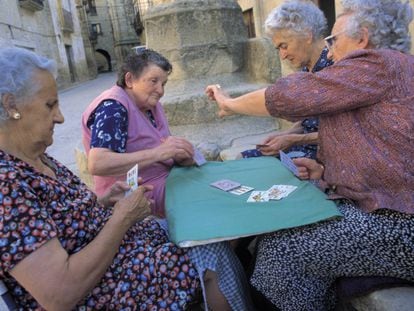 Women in a Spanish village enjoying some fresh air.