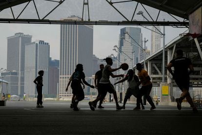 Teenagers playing basketball on Thursday in New York.