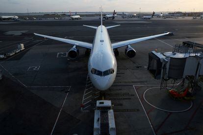 An airplane sits on the tarmac at John F. Kennedy International Airport on the July 4th weekend in Queens, New York City, on July 2, 2022.