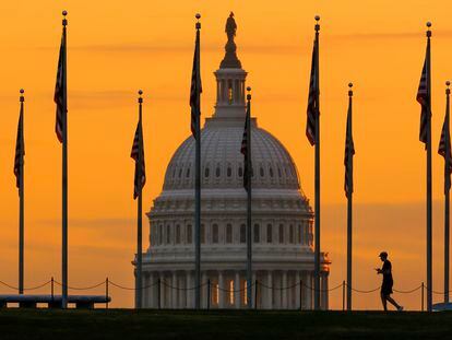The U.S. Capitol Building looms behind flags on the National Mall in Washington Nov. 7, 2022.