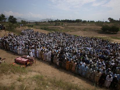 People attend funeral prayers for victims, who were killed in a blast, in Bajaur district of Khyber Pakhtunkhwa province, Pakistan, on July 31, 2023.