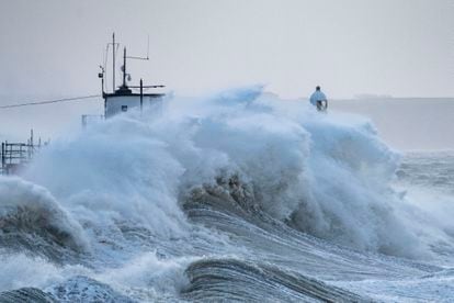 Waves pound the harbor at Porthcawl, Wales (UK) during Storm Eunice; February 18, 2022.