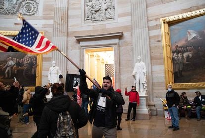 Supporters of US President Donald Trump protesting inside the US Capitol on January 6 after breaching security.
