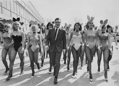Hugh Hefner with models at Heathrow airport in June 1966.
