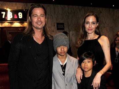 Brad Pitt and Angelina Jolie with two of their children, Maddox Jolie-Pitt and Pax Jolie-Pitt, in London in 2013.
