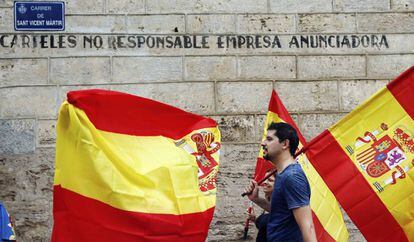 Spanish flags on display at an anti-referendum protest in Valencia today.