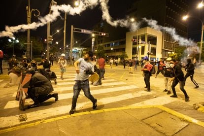 Clashes between demonstrators and police during protests in Lima on Monday.