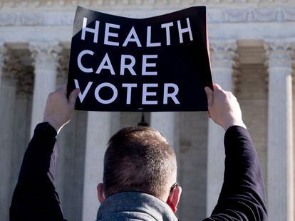 Supporters of the Affordable Care Act (ACA) demonstrate outside the US Supreme Court while the court hears oral arguments in the latest Republican challenge to the Affordable Care Act (ACA), in Washington, DC, USA, 10 November 2020.
