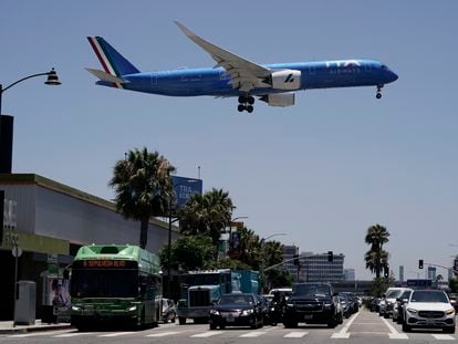 An ITA Airways passenger jet approaches to land at the Los Angeles International Airport in Los Angeles, on July 1, 2022.